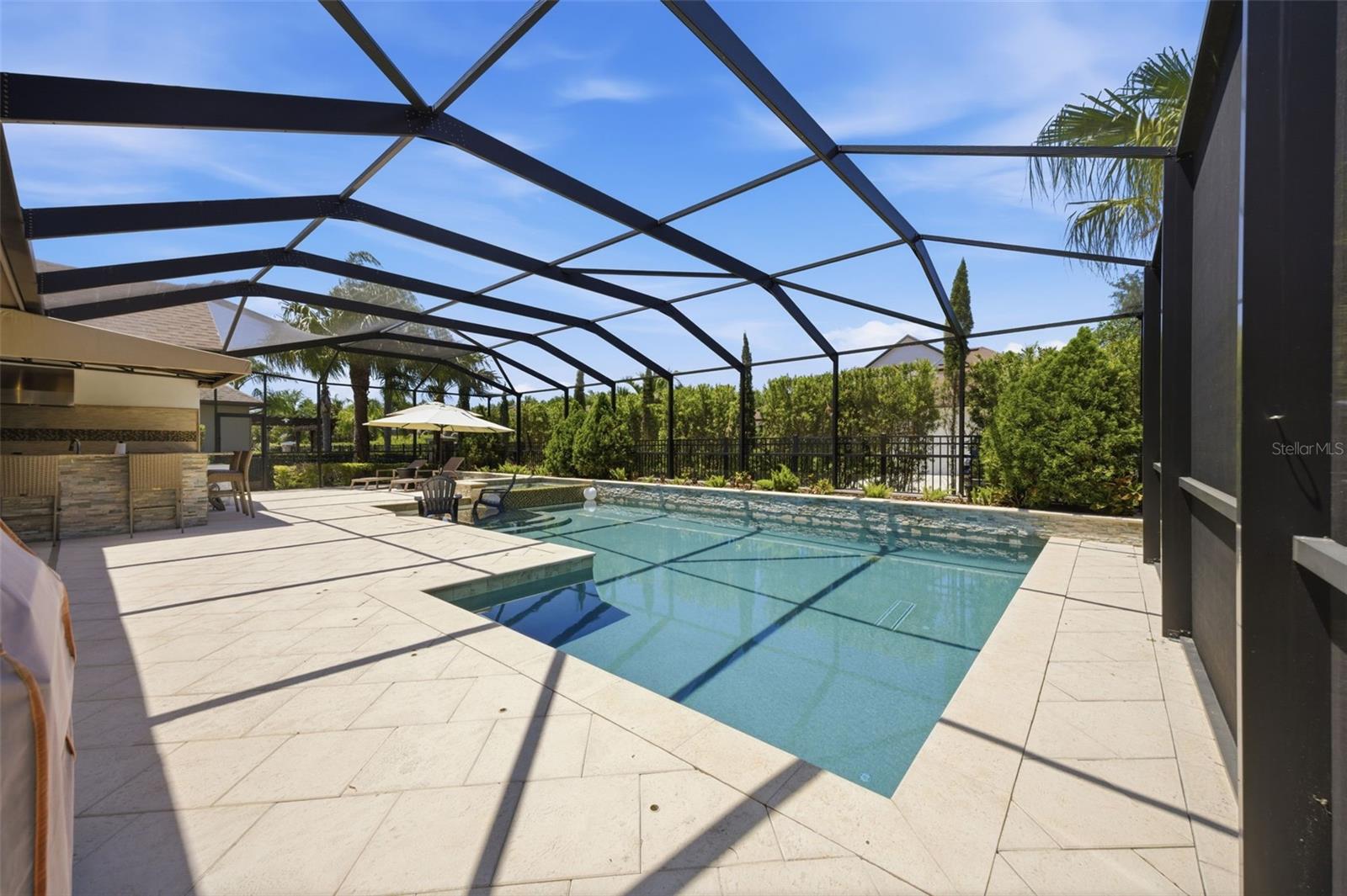 Gorgeous heated saltwater pool area.