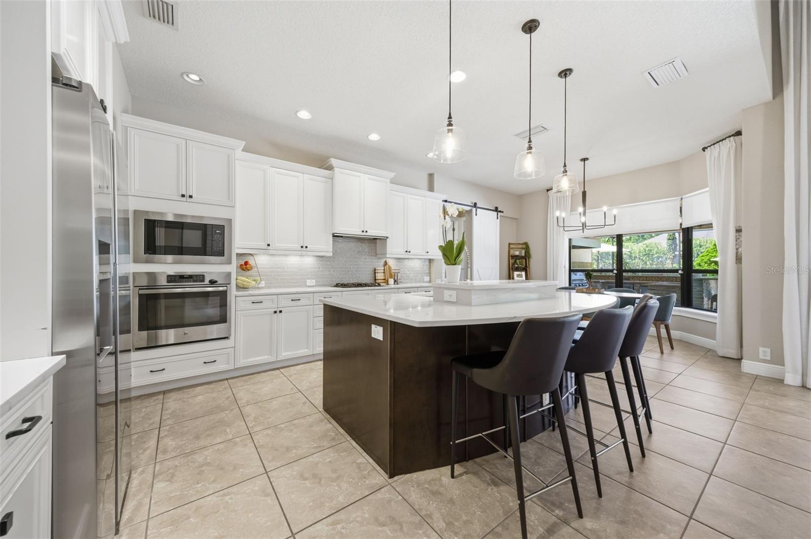 Large open plan kitchen and great room living area.