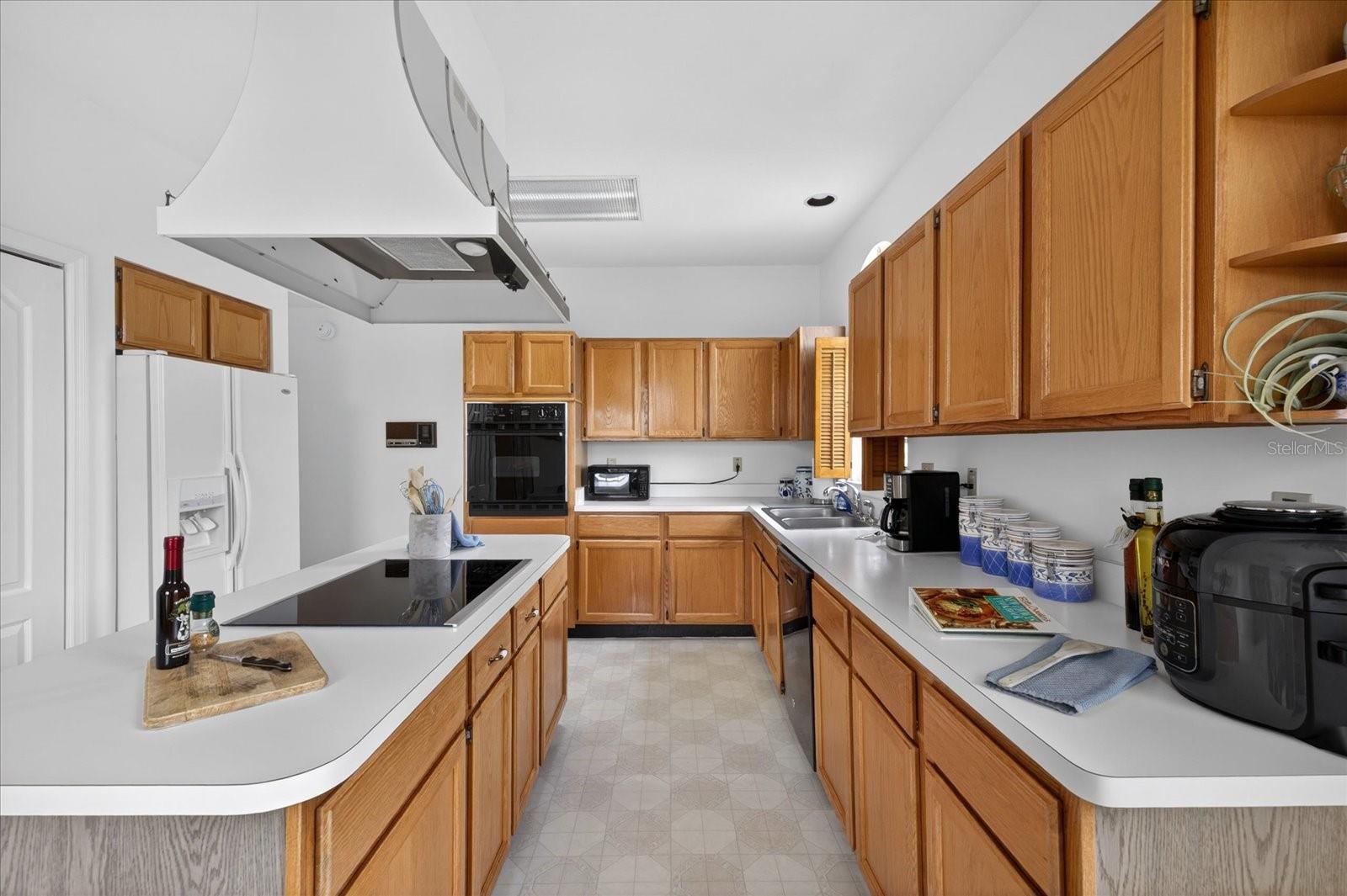 Kitchen has tons of storage and counter space