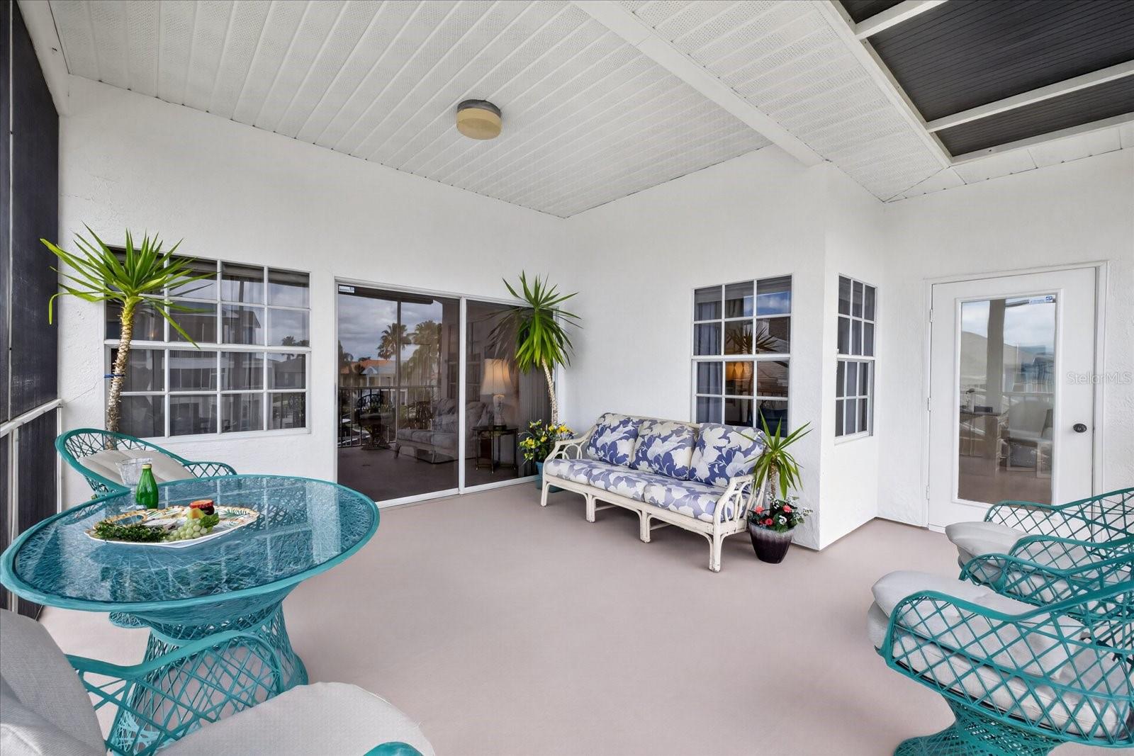 Upper waterfont balcony from main living room and primary