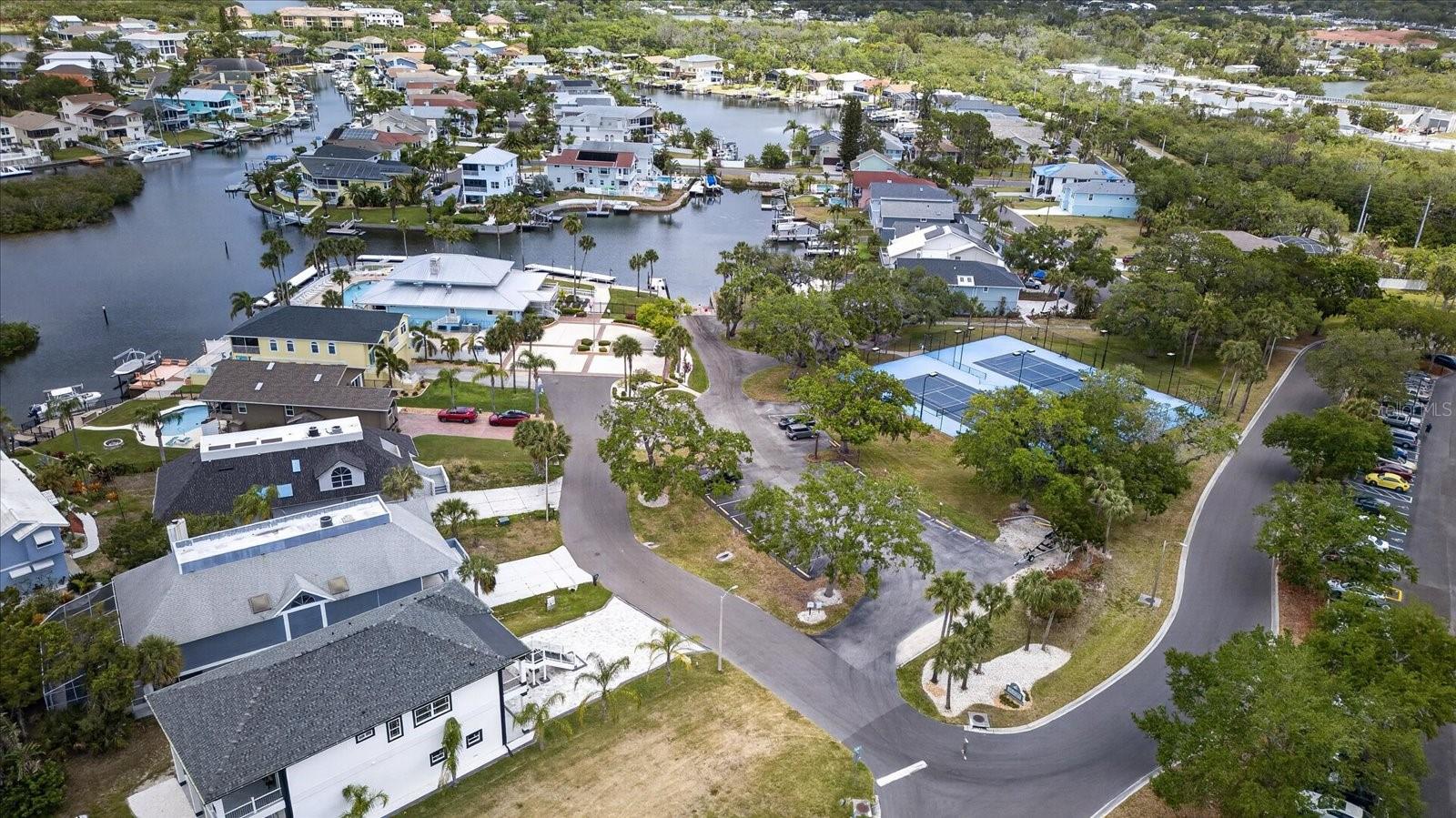 Gulf Landings Clubhouse, tennis courts, pool, docks and sauna.
