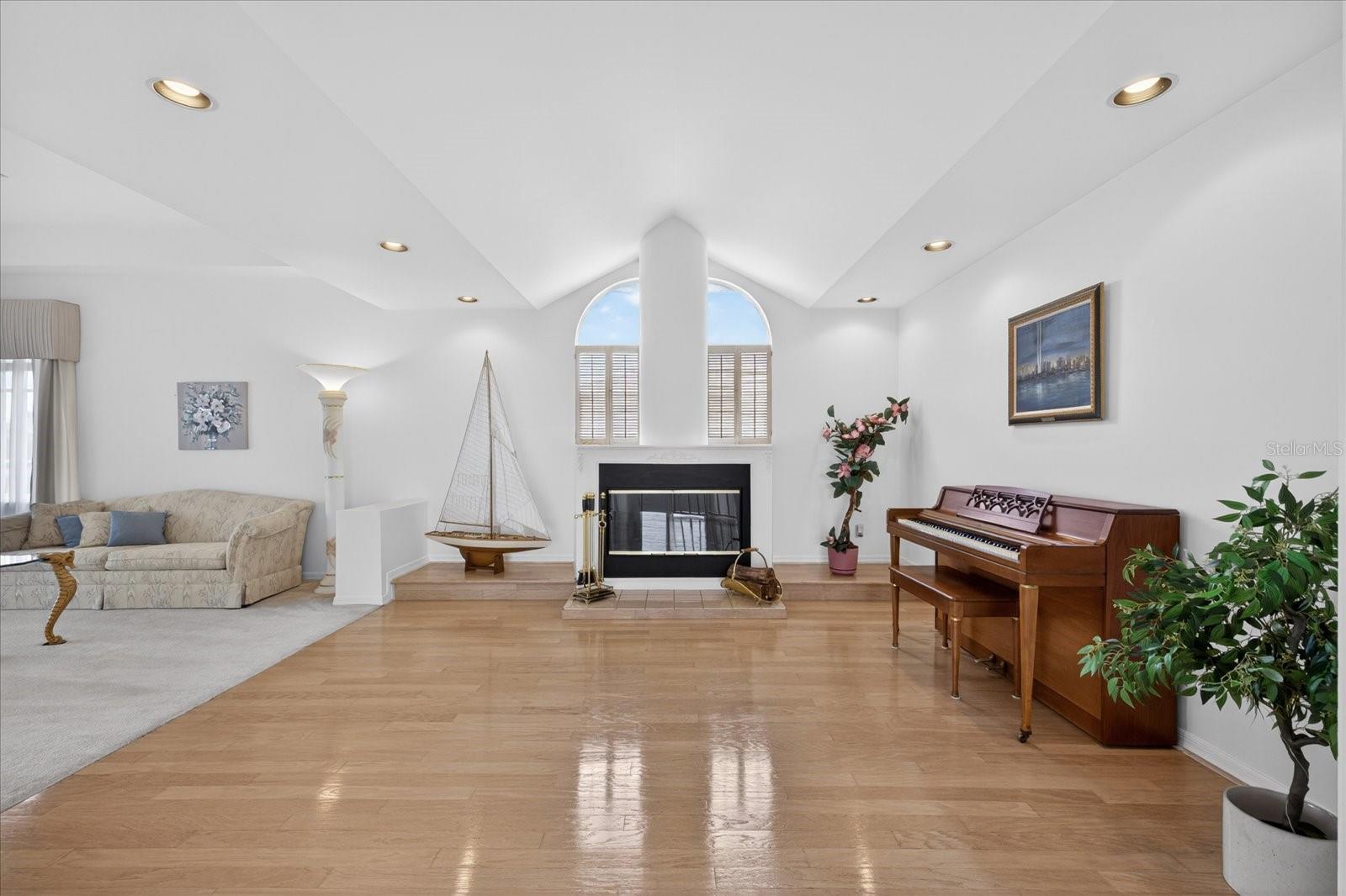 Main living room with wood fireplace