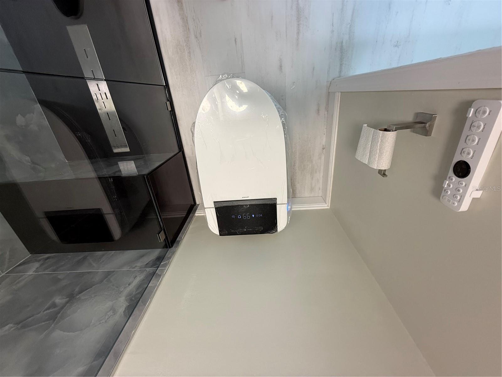 Smart Toilet with Built-in Bidet, Seat Heater, Auto-Flush and More!