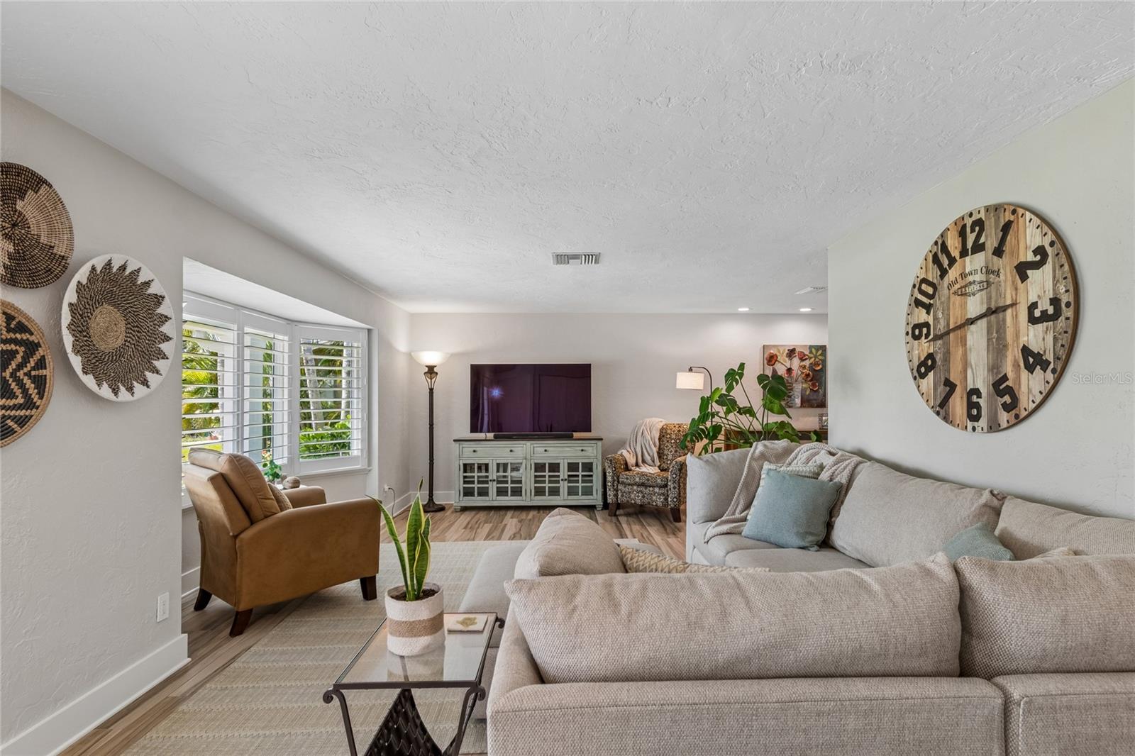 Expansive living room with plantation shutters