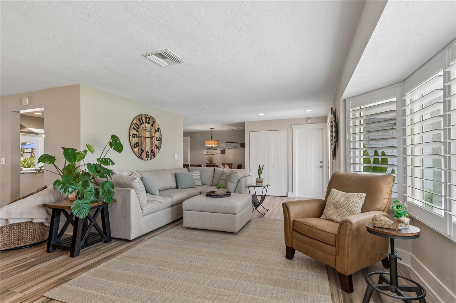 Great room with natural light, refined finishes