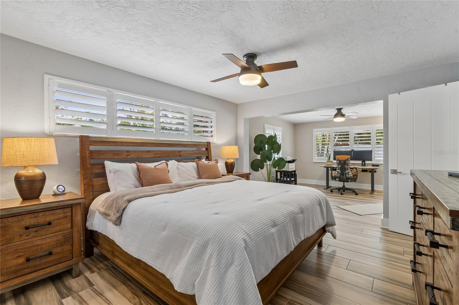 Generous primary suite, split plan, sun-drenched