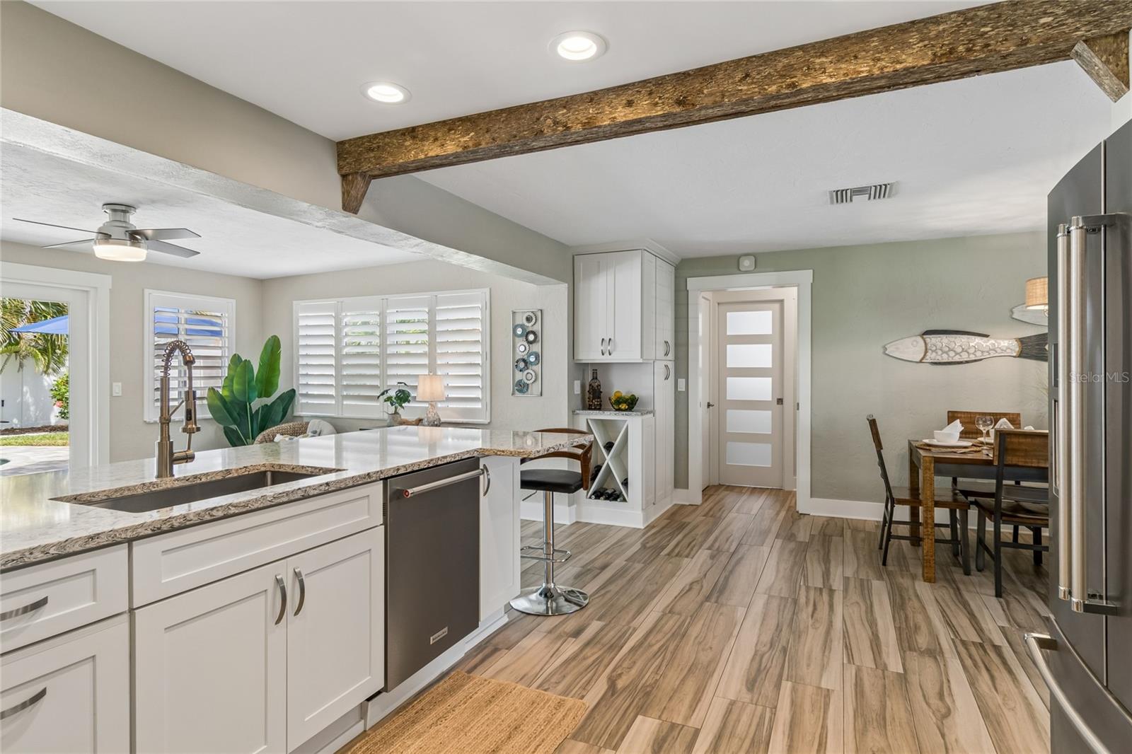 Showpiece kitchen, cypress beam, quartz