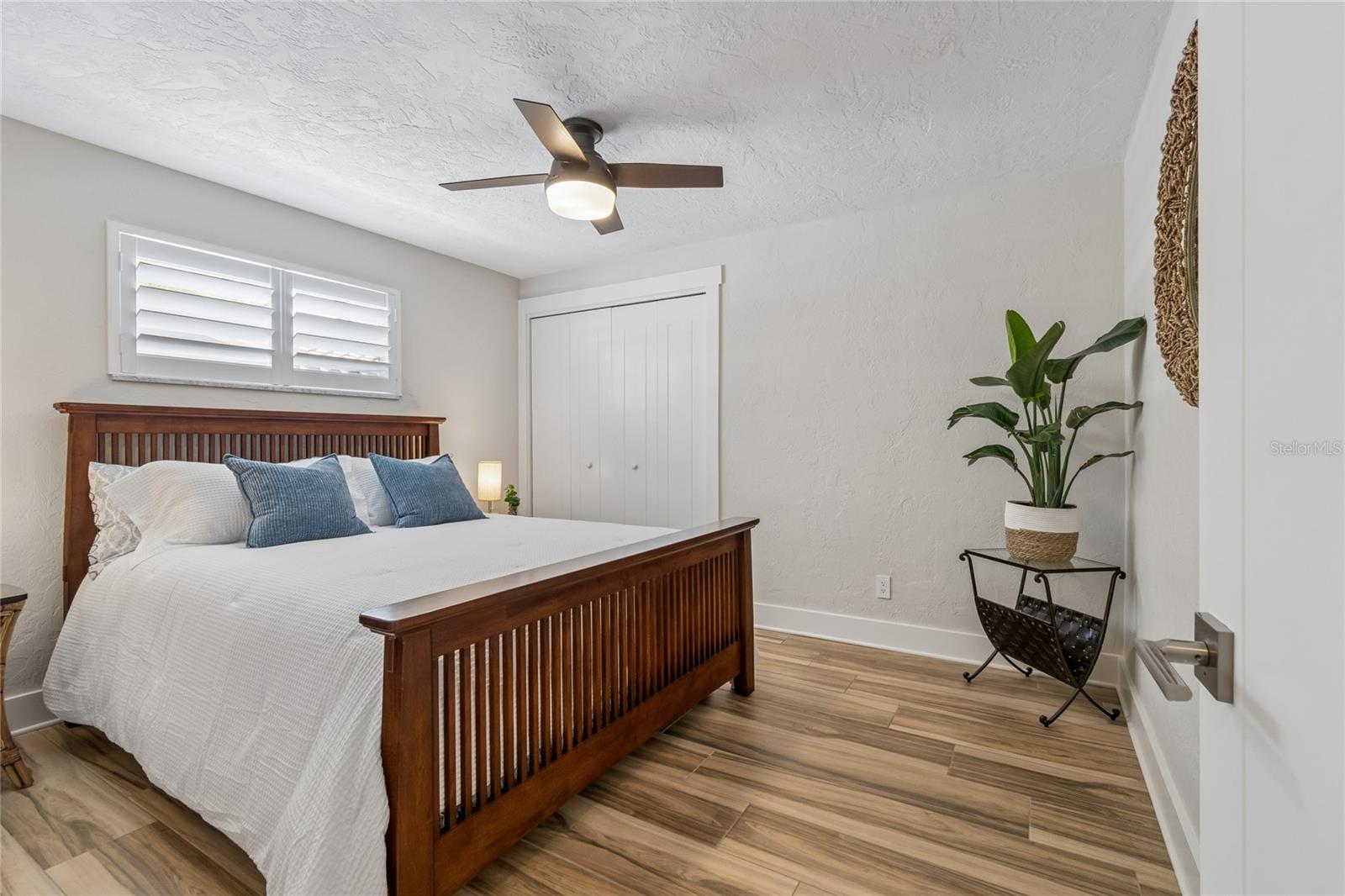 uest bedroom, natural light, plantation shutters