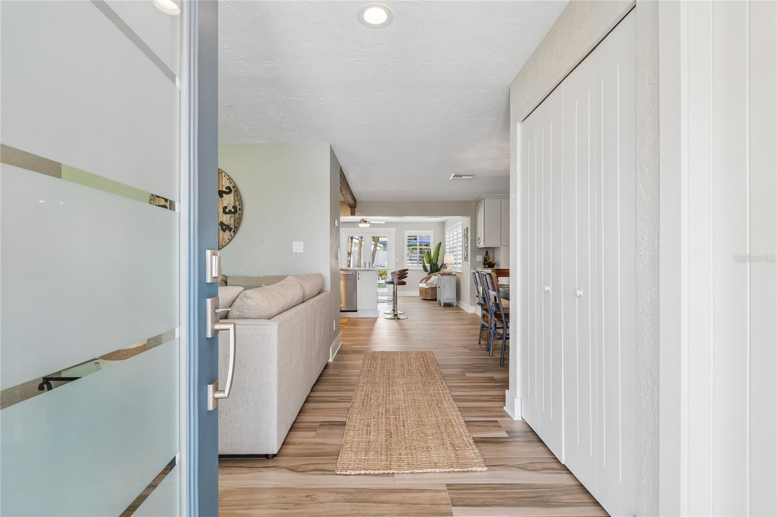 Driftwood porcelain floors, open feel