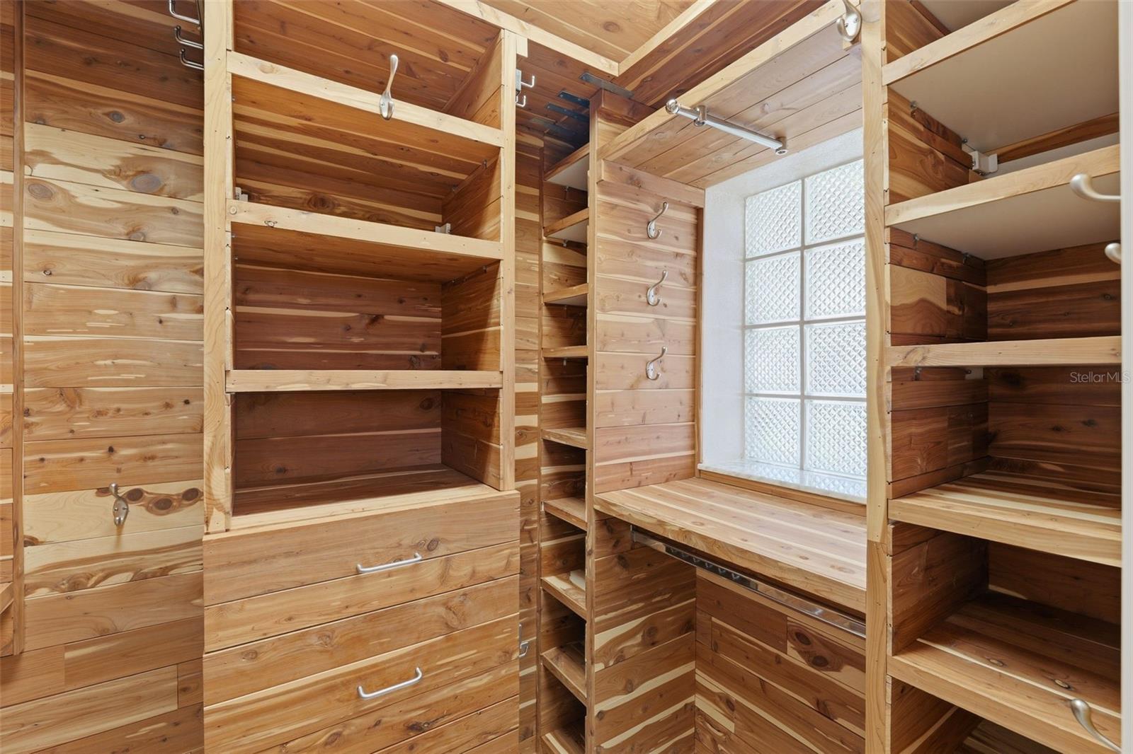 Walk-in cedar closet in primary