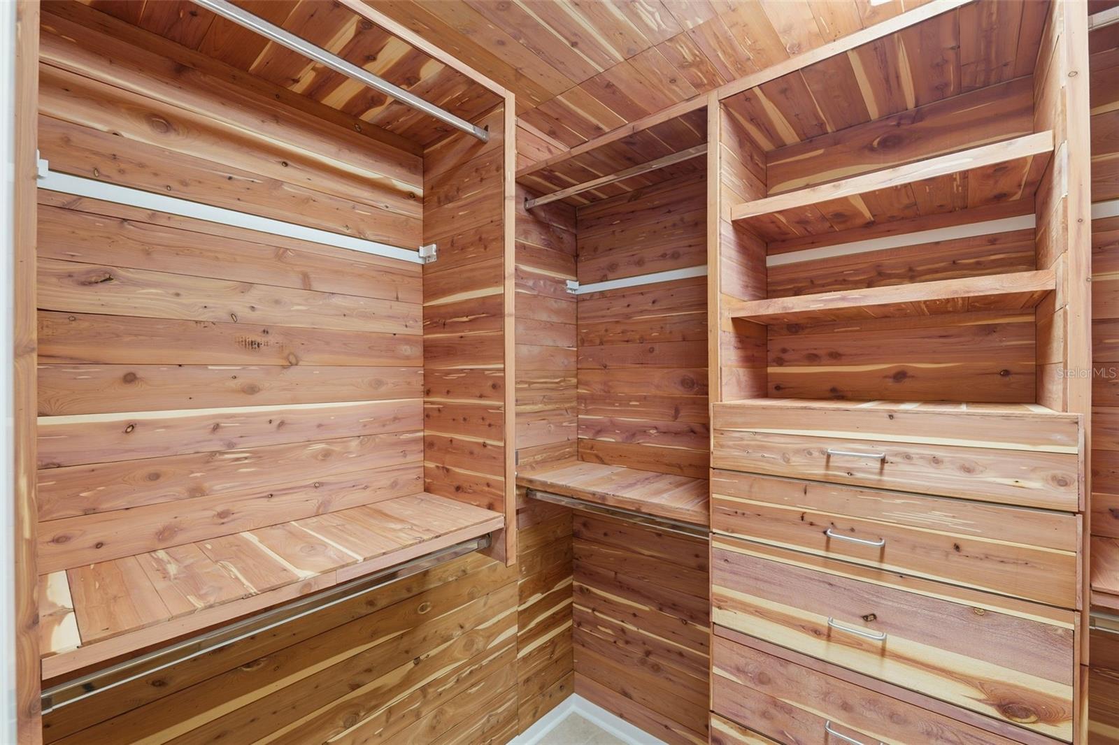 Walk-in cedar closet in primary