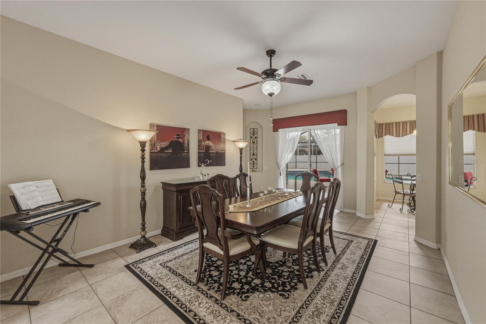 An elegant front-facing dining room that sets the tone for memorable gatherings the moment you walk in.