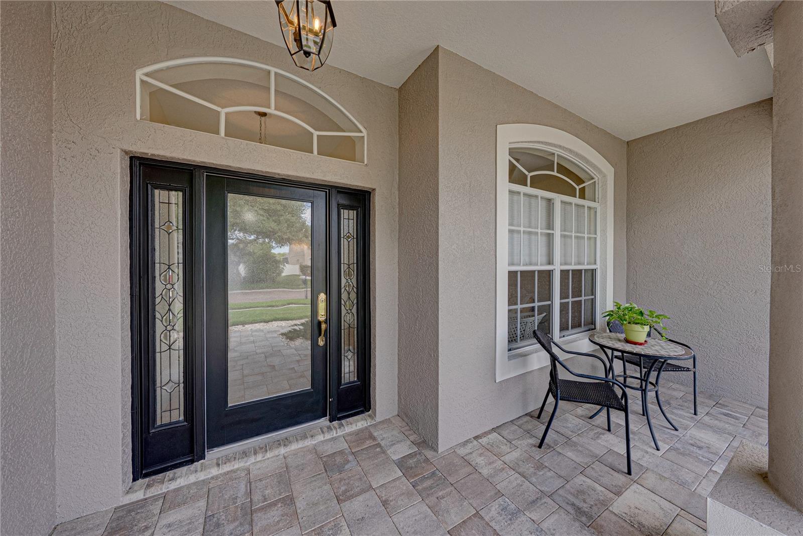 Welcoming front patio ready for your morning coffee.