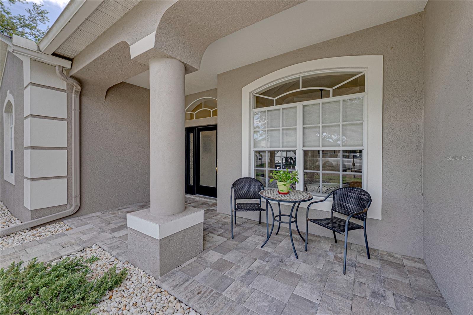 Welcoming front patio ready for your morning coffee.