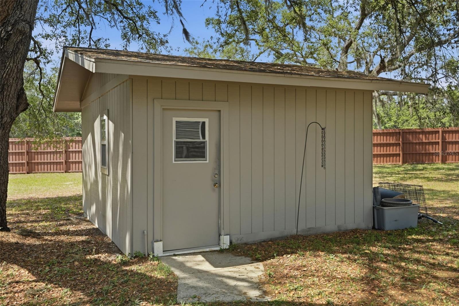 Shed.  3 Acres, 3/2/2 Single Family Home, 2/2 Manufactured Home, Shed, Barn, Gazebo, Sunroom, and Screen Enclosed Hot Tub. Zoned AR, bring your farm animals, store your boat and RV, potential to build another home on the property!