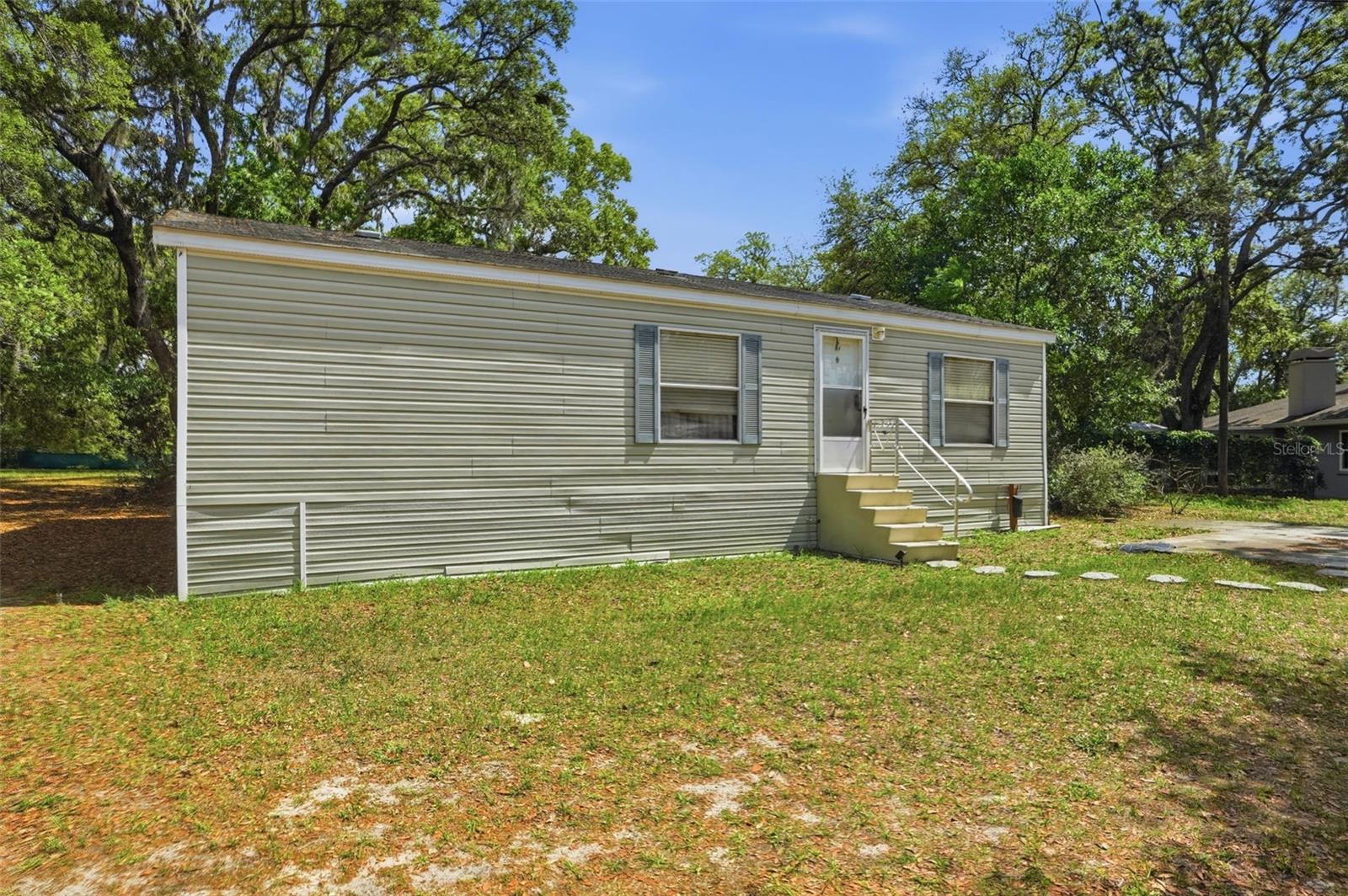 3 Acres, 3/2/2 Single Family Home, separate 2/2 Manufactured Home, Shed, Barn, Gazebo, Sunroom, and Screen Enclosed Hot Tub. Zoned AR, bring your farm animals, store your boat and RV, potential to build another home on the property!