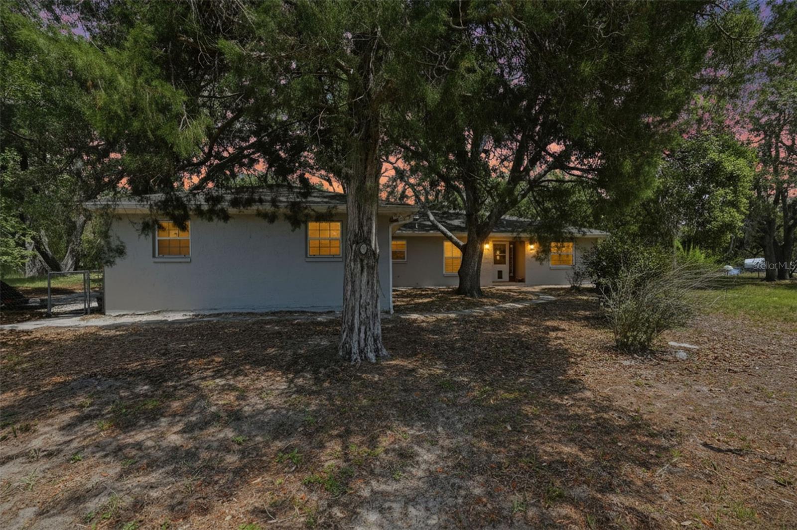 3 Acres, 3/2/2 Single Family Home, separate 2/2 Manufactured Home, Shed, Barn, Gazebo, Sunroom, and Screen Enclosed Hot Tub. Zoned AR, bring your farm animals, store your boat and RV, potential to build another home on the property!