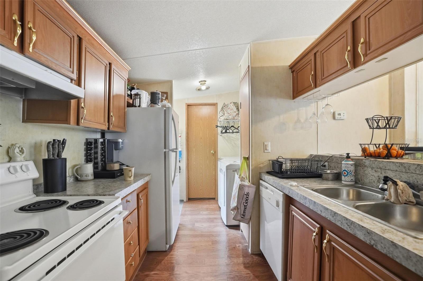 Kitchen in 2/2 Manufactured Home Built in 2006 with 2 Primary Bedrooms/Bathrooms