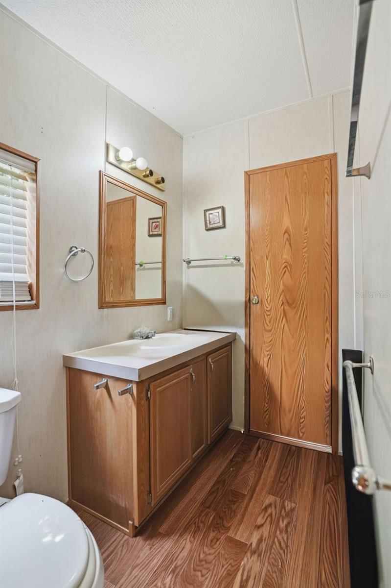 Bedroom near Front Door Foyer and 2nd door near Back Door and Laundry Area
