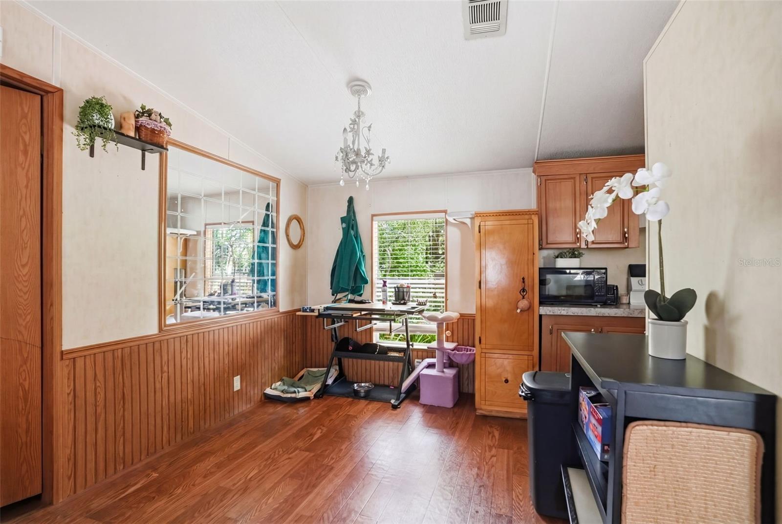 Dining Room in 2/2 Manufactured Home Built in 2006 with 2 Primary Bedrooms