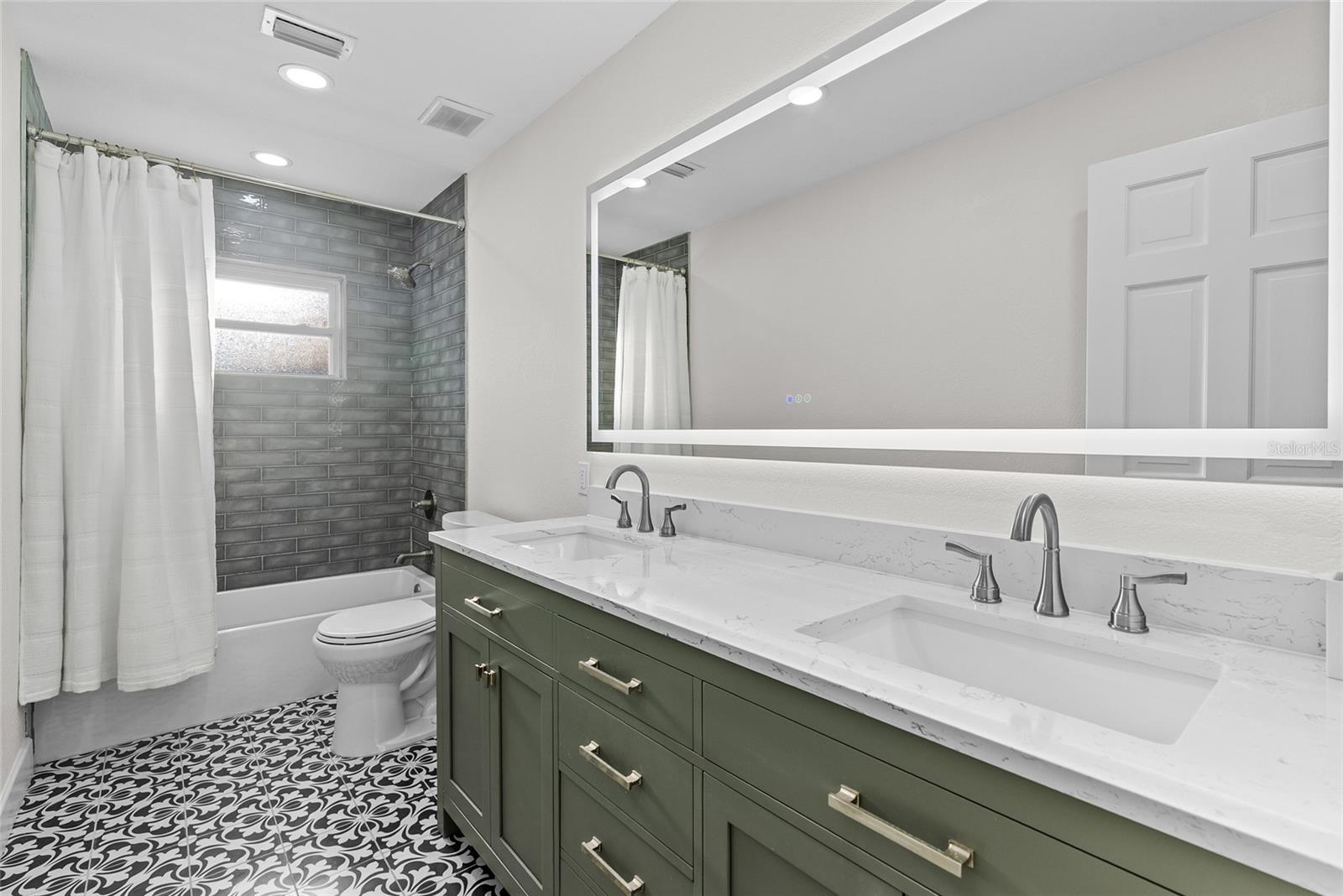 Guest bathroom with double sinks
