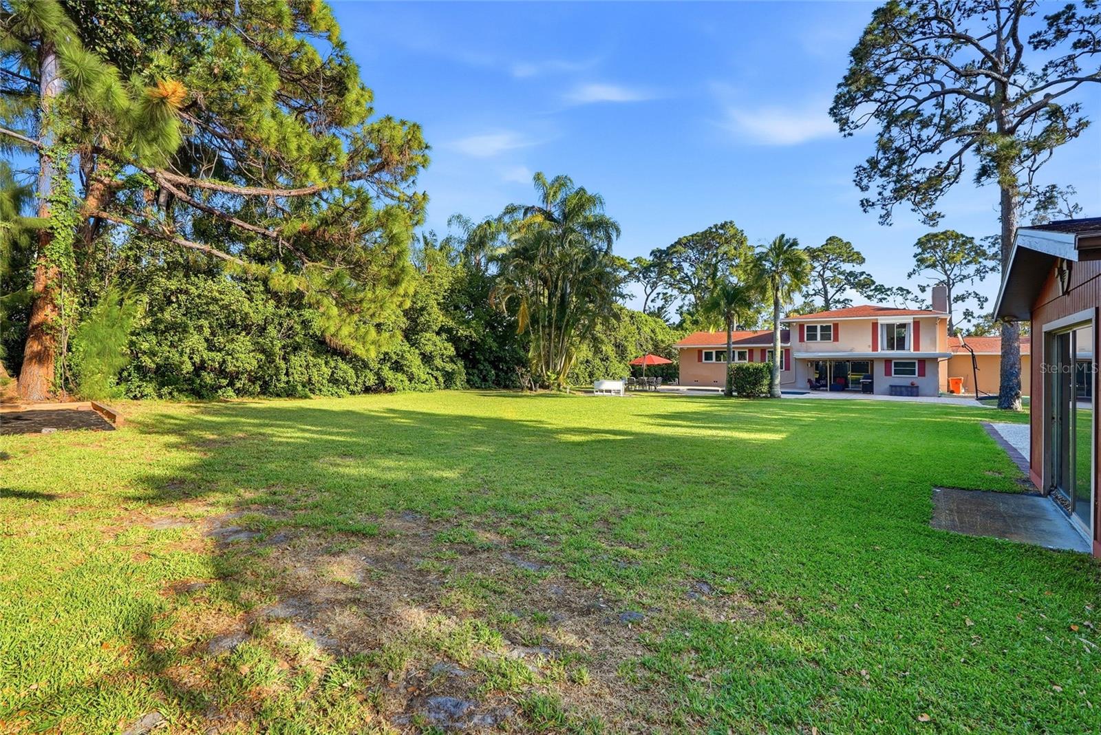 Your options are endless with this yard: Wiffle Ball Fun, slip n slide, football, Holiday Parties