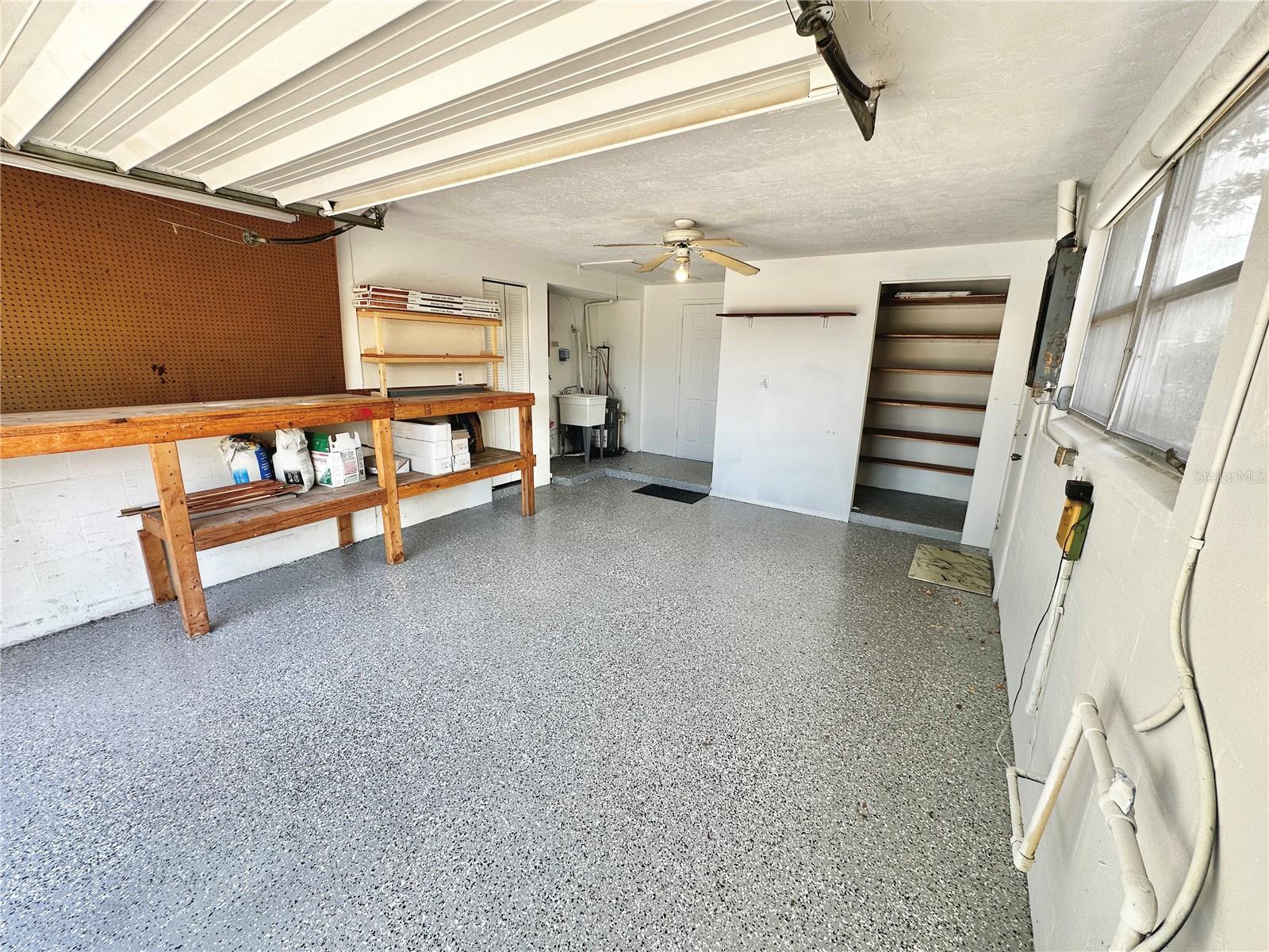 1 car garage with work bench and tool storage