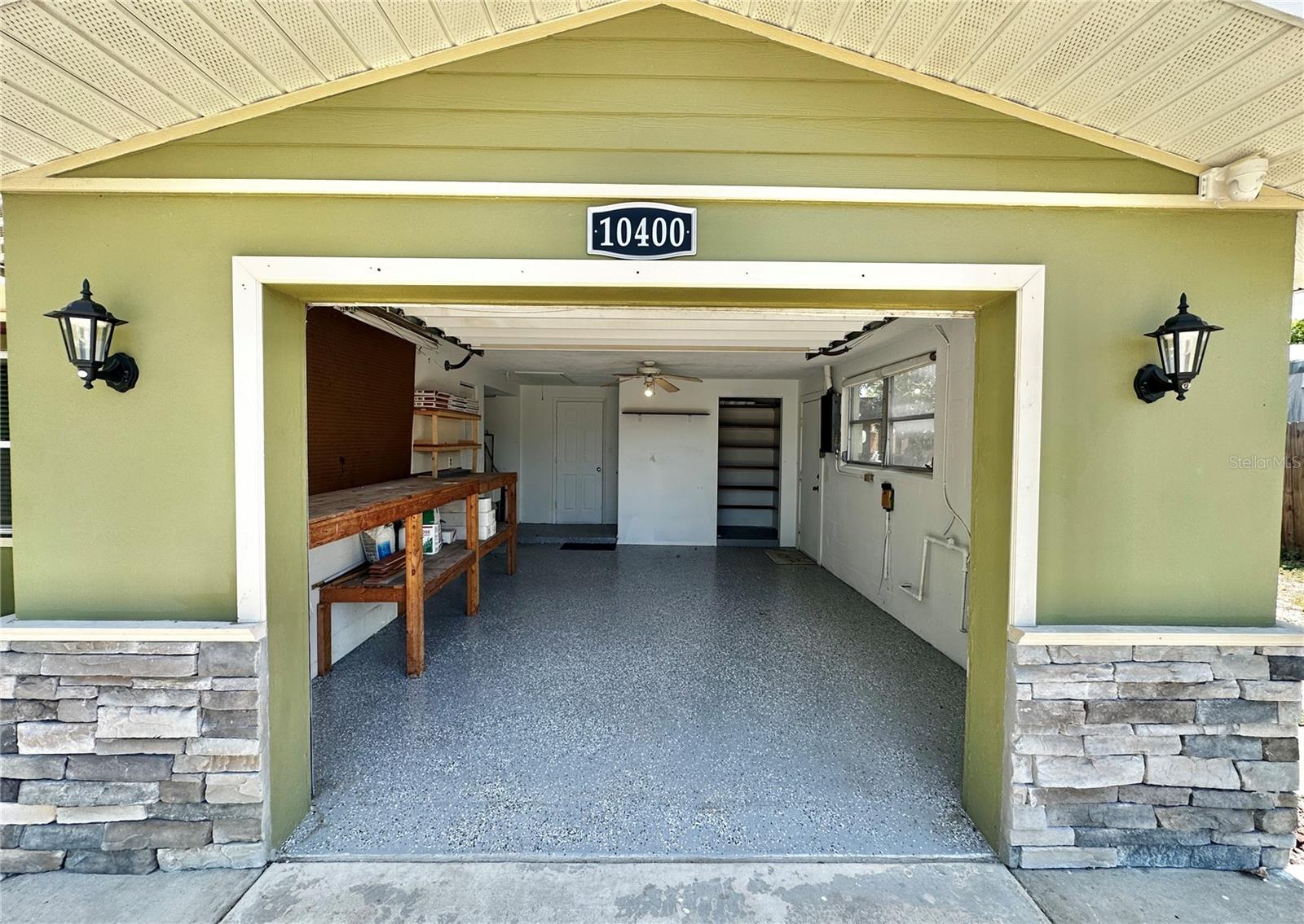 1 car garage with work bench and tool storage