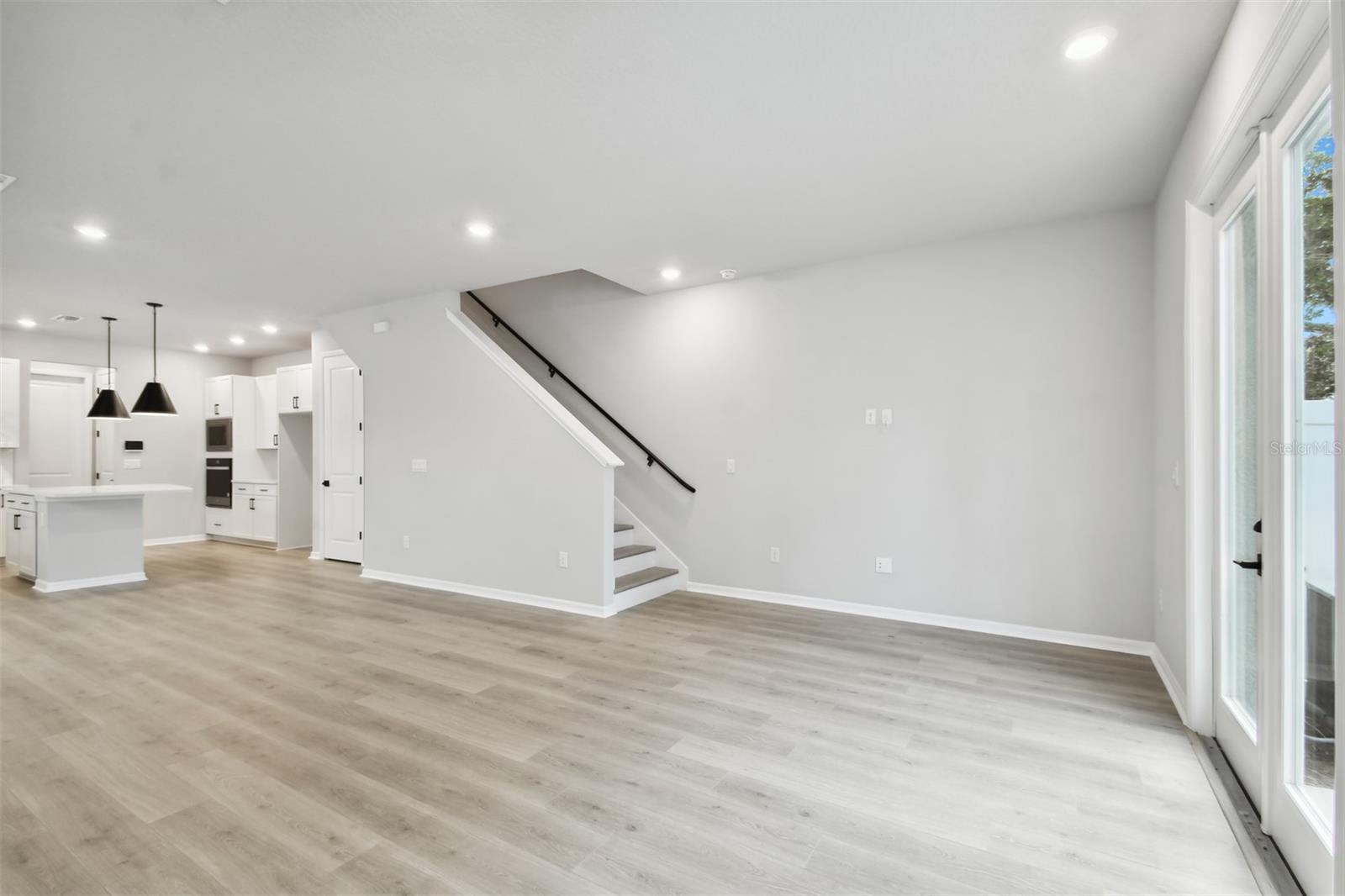 Family Room **Photos are of a similar home