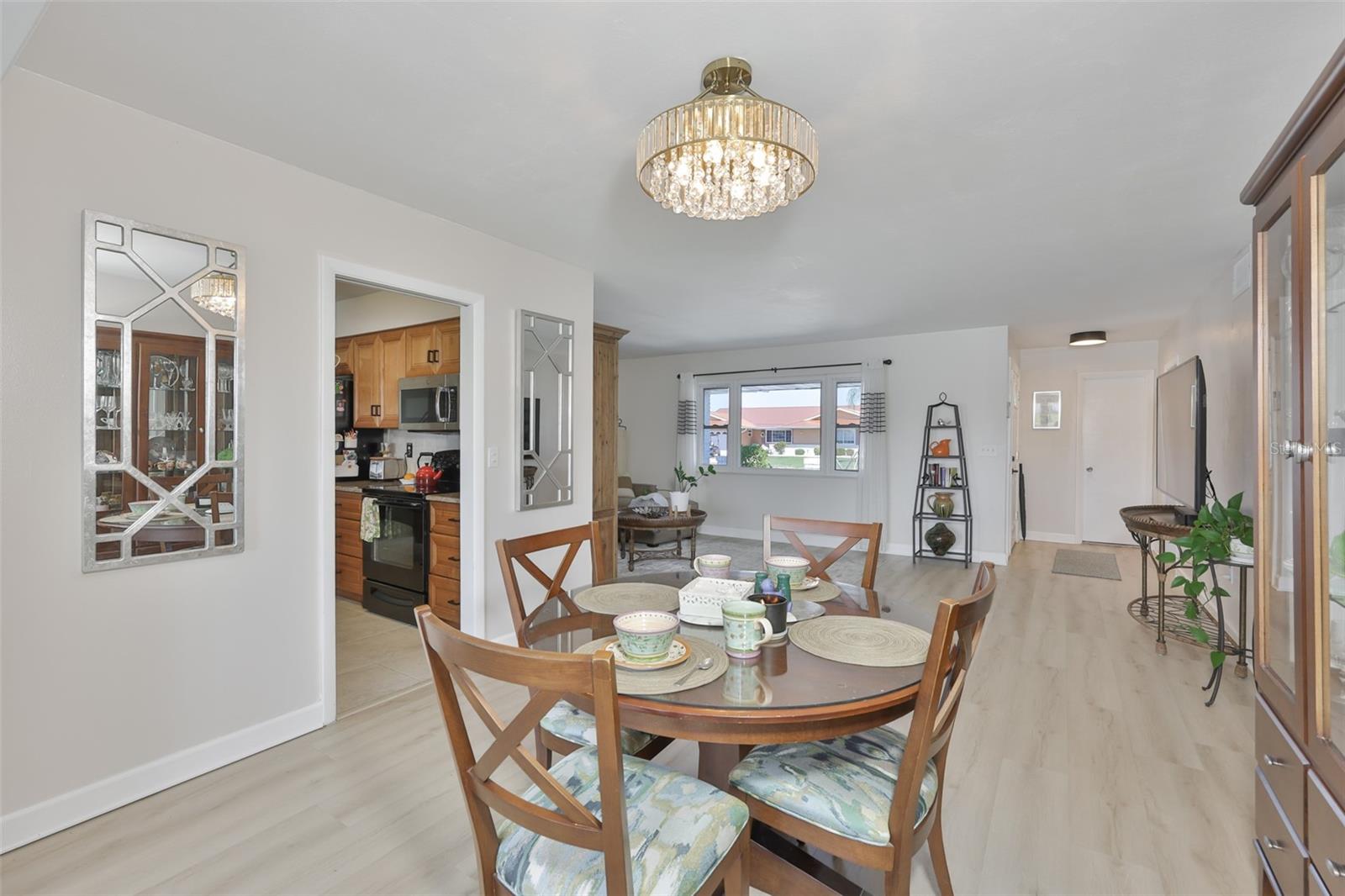 New LVT Plank Flooring Throughout Main Living Area, Updated Fans & Fixtures, Light & Bright Color Scheme, Fantastic South Lake Water View