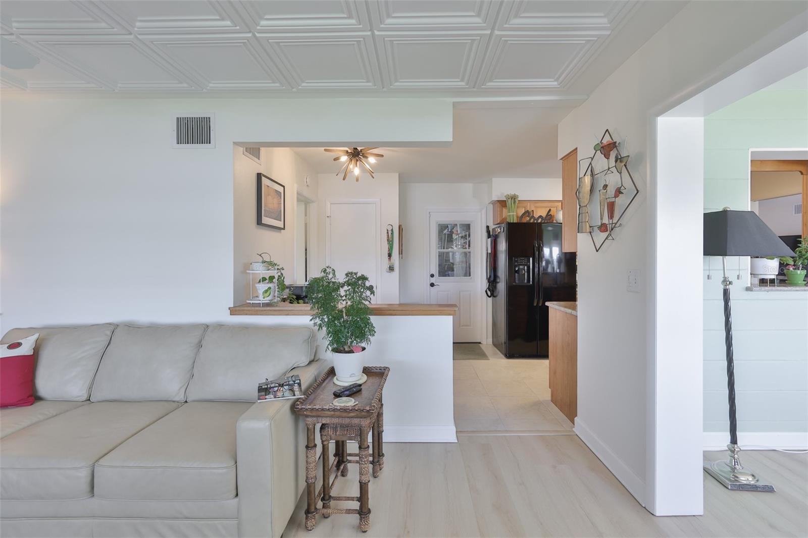 Great Room, Classic Elegance Coffered Ceiling, Ample Room for Entertaining, Bright & Cheerful