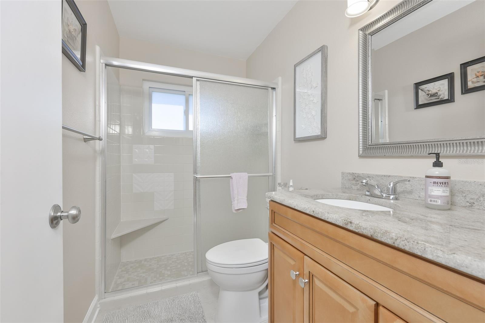 Guest Hall Bath, Wood High-Top Vanity & Exquisite Granite Countertop, Updated Mirror & Fixtures, Walk In Shower
