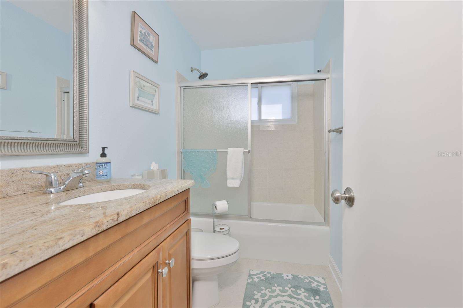 Primary Bath, Wood High Top Vanity & Exquisite Granite Countertop, Updated Mirror & Fixtures, Tub/Shower