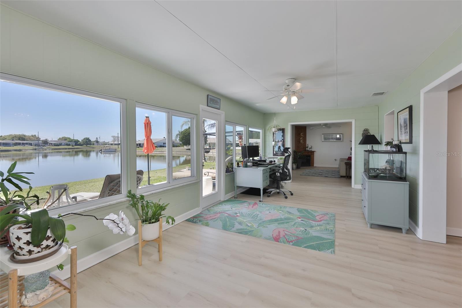 Enclosed Lanai-Newer Windows & Door, Tons of Light & Peaceful Lake Views