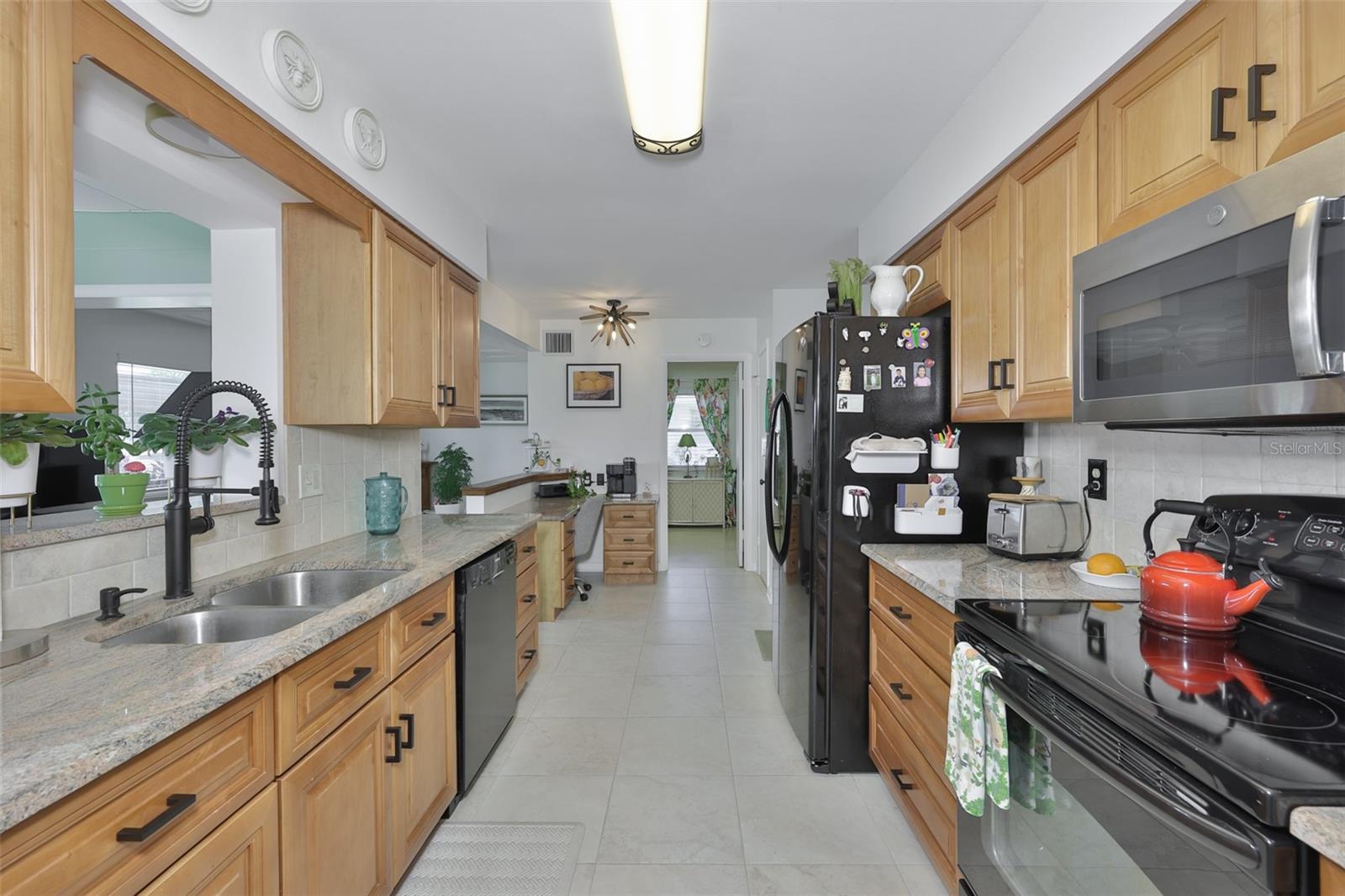 Galley Kitchen, Wood Cabinets, Granite Countertops, Built In Desk, Closet Pantry, Pass Through