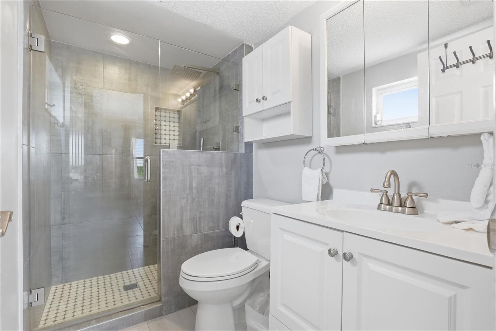 Primary bathroom area with walk in shower