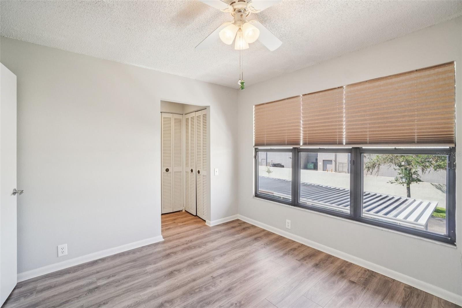 BEDROOM 2 OVER LOOKS FRONT COURT YARD