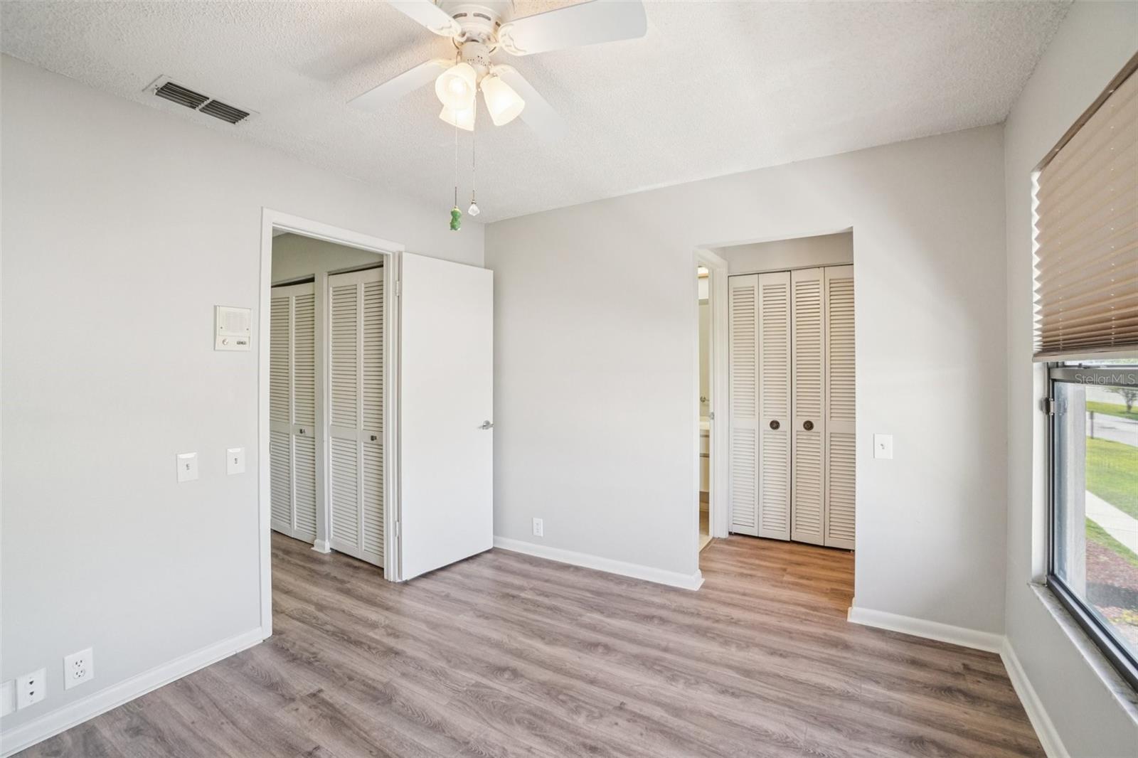 BEDROOM 2 OVER LOOKS FRONT COURT YARD