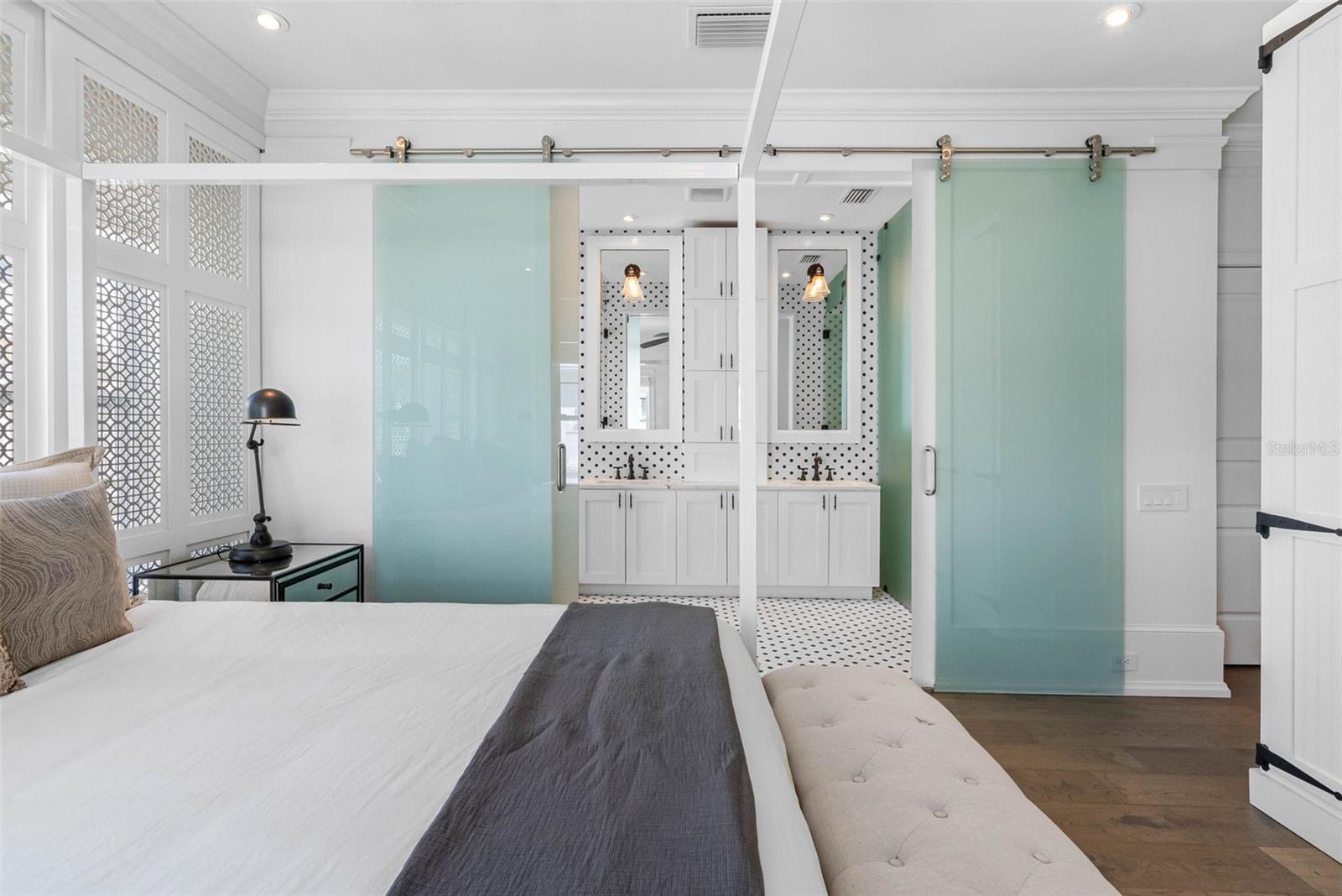 Privacy Glass Barn Doors to Ensuite Bath