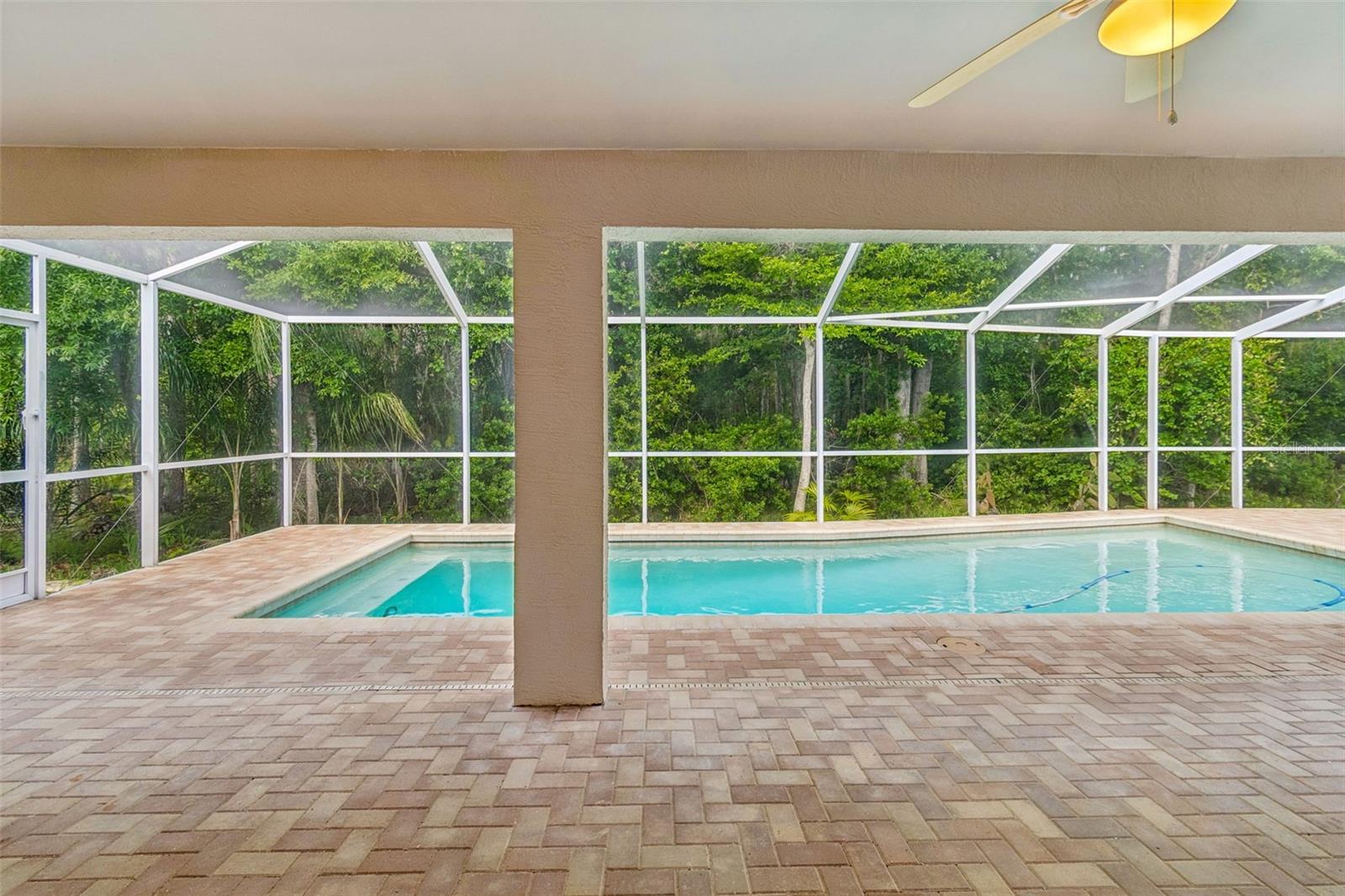 Fabulous covered patio with a screened and heated pool is perfect for those pool parties, BBQ's and al fresco dining!