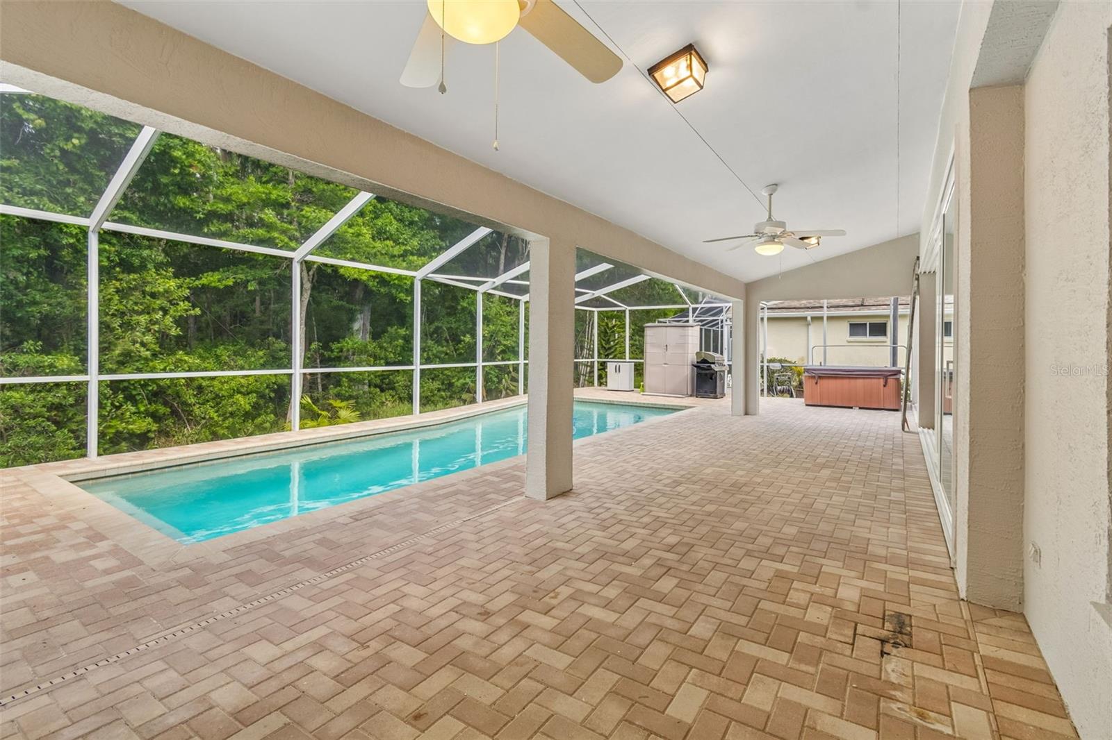Pavered patio is a beautiful addition to this amazing home.