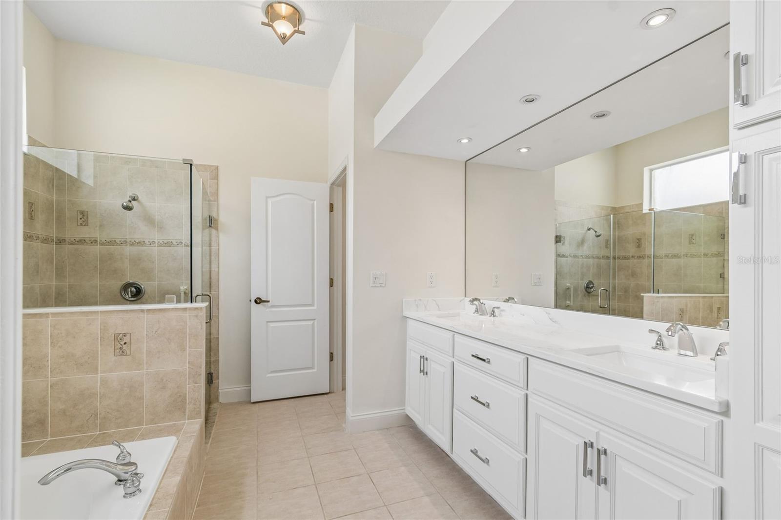 Owner's en-suite bath, newly remodeled for modern and fesh start!