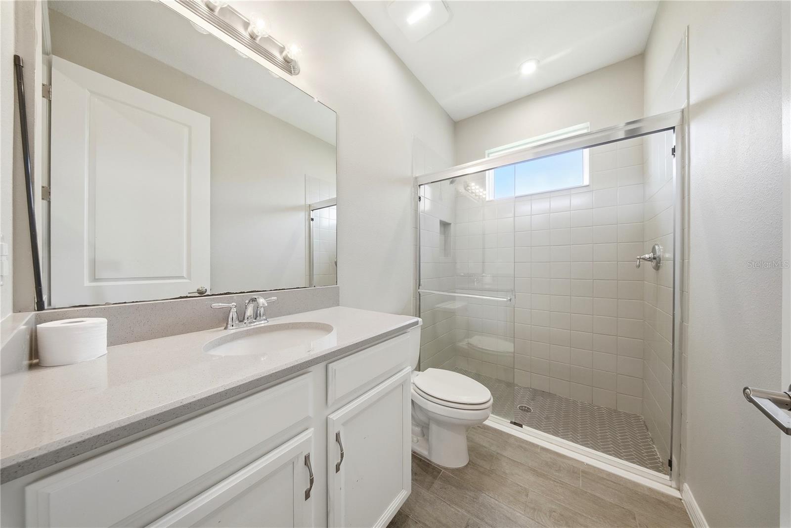 FULL BATH #3 BETWEEN MEDIA ROOM & BEDROOM #4