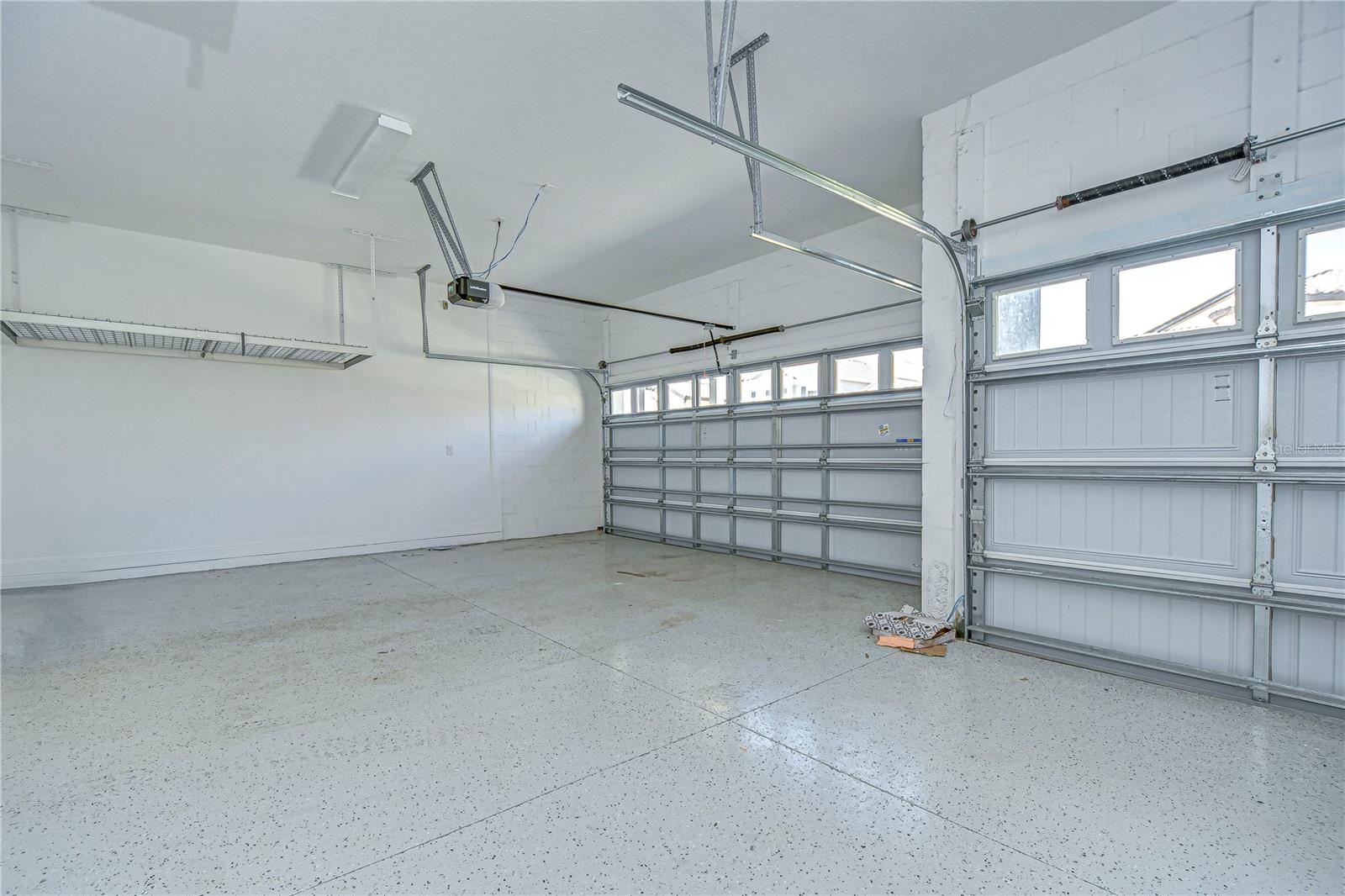 3-Car Garage – Perfect for Vehicles, Golf Cart, or Hobby Space