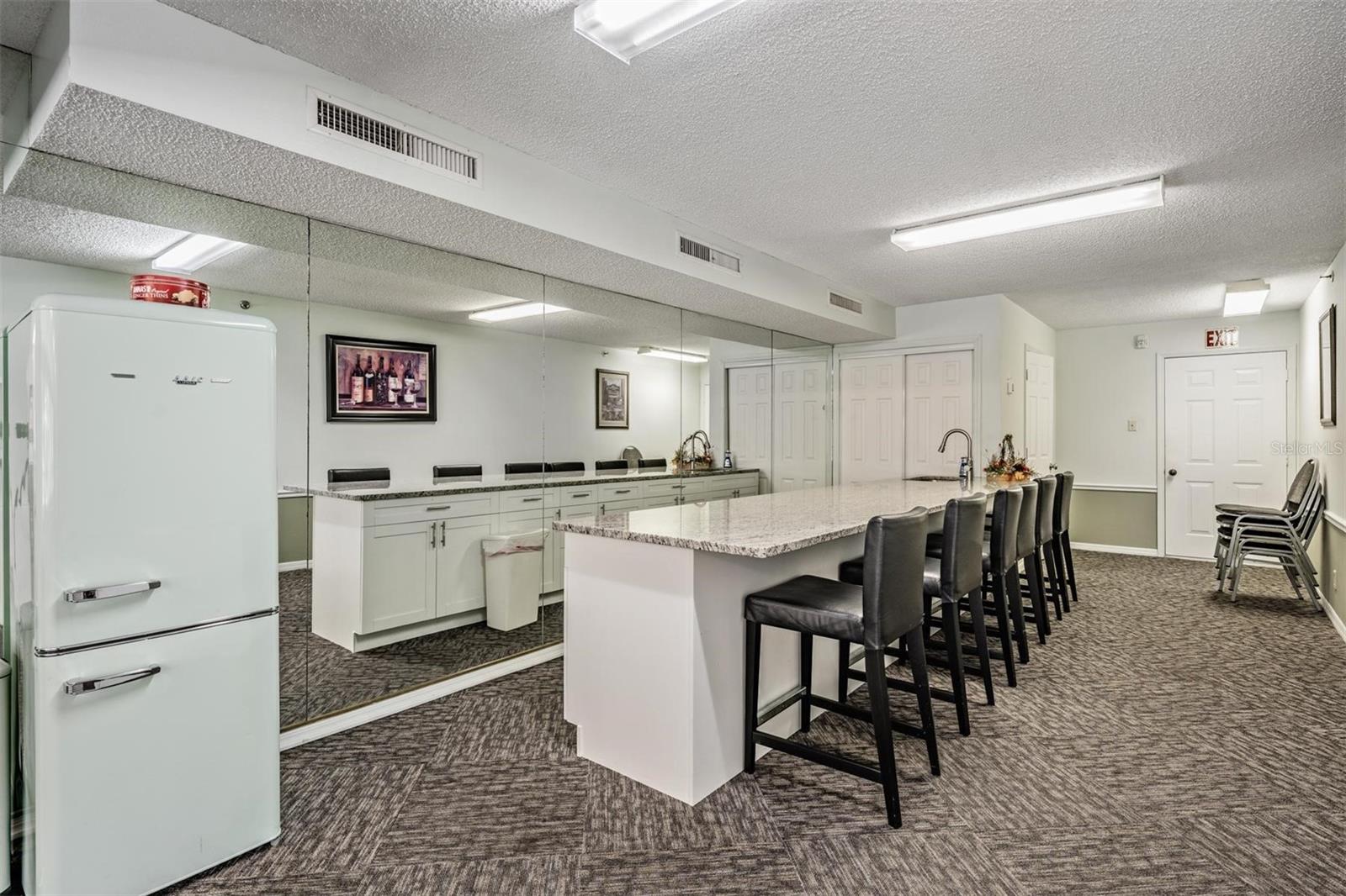 Club room has a kitchen and lots of space