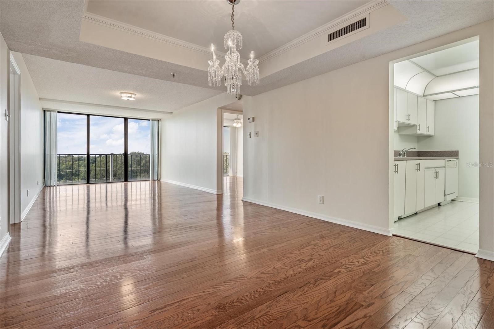 3 sets of sliding glass doors wash the unit in natural light