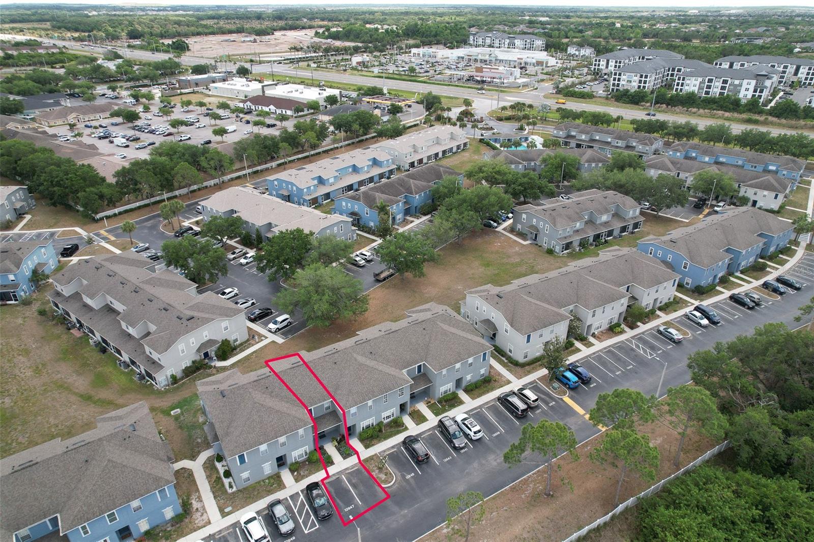 Across the street from a brand-new Starbucks and Publix
