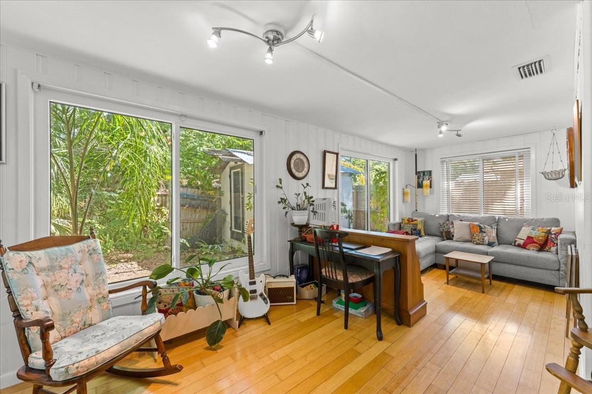 Light filled Florida room with impact glass
