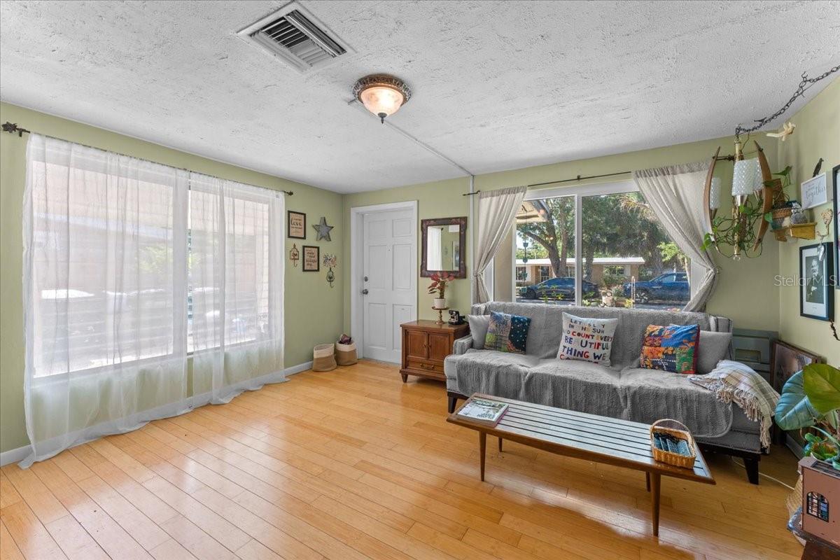 Living room with impact glass picture window