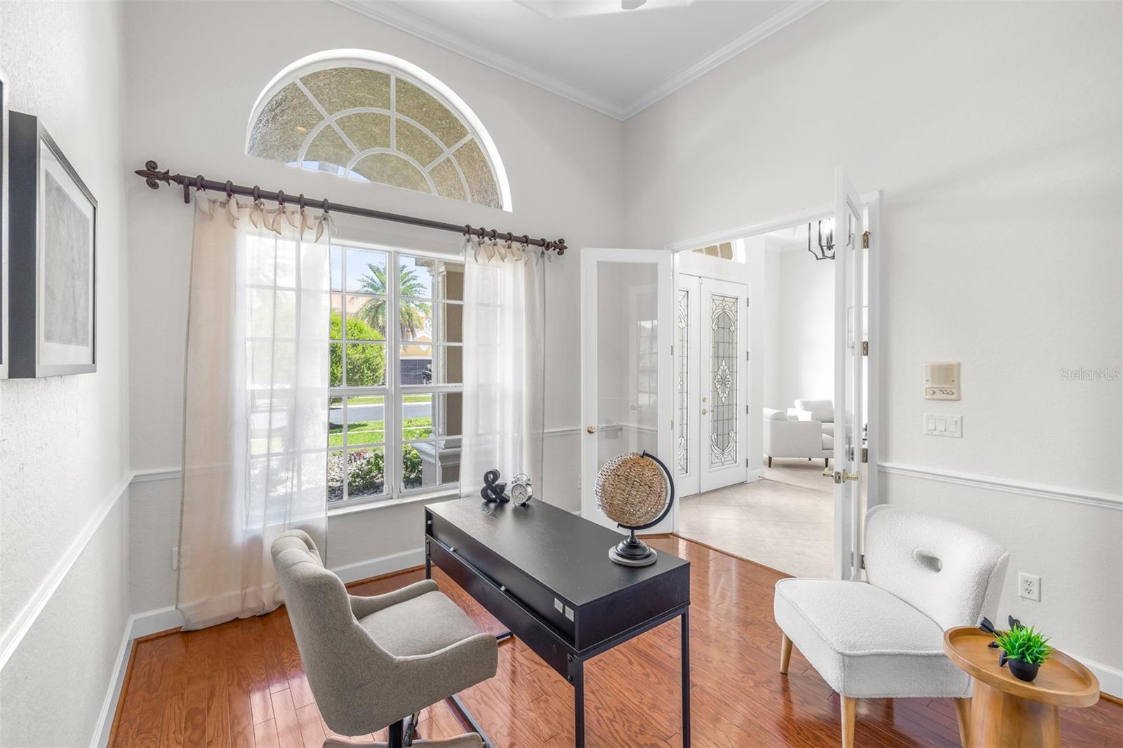 Dedicated office with French doors at front of the home
